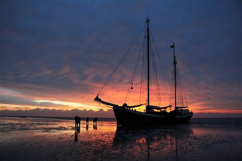 Klipper Poseidon droogvallen Waddenzee