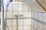 Betegelde douche aan boord van de Spes Mea