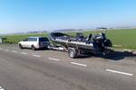 RIB van de Vrijheid op een boottrailer langs de weg