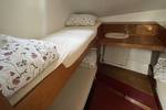 Stapelbed in een hut van de Waterman